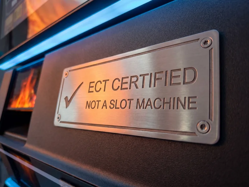 Close up of the certification plate on the body of the Foxfire cabinet.