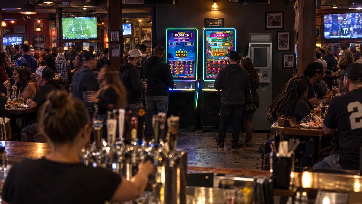 Foxfire cabinets and a payout kiosk in a busy bar