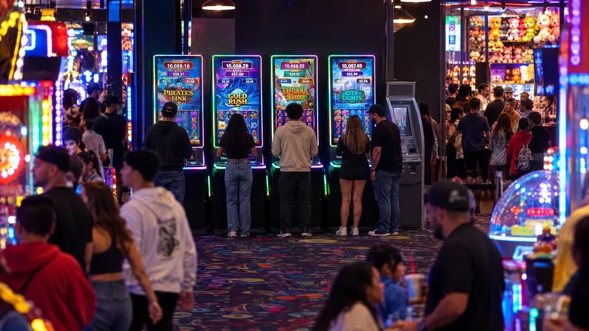 Foxfire cabinets and a payout kiosk in a fun center