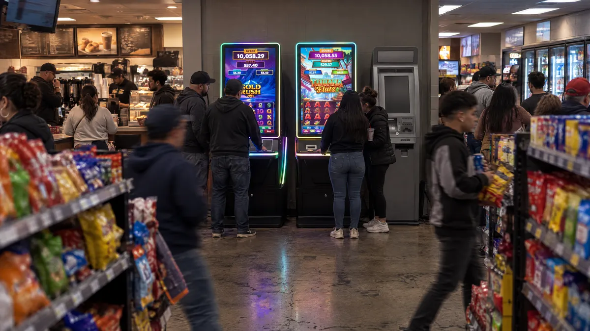 Foxfire cabinets and a payout kiosk in a gas station